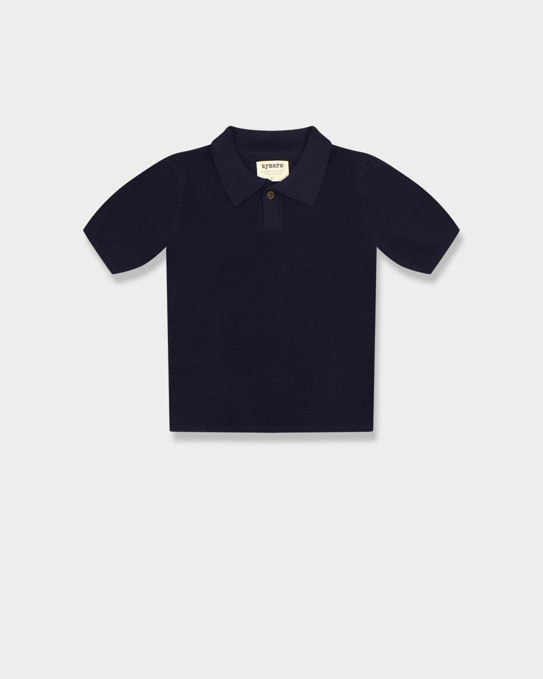 Knitted boys polo shirt Enzo navy.   Made of organic cotton. Ethically made in Peru.